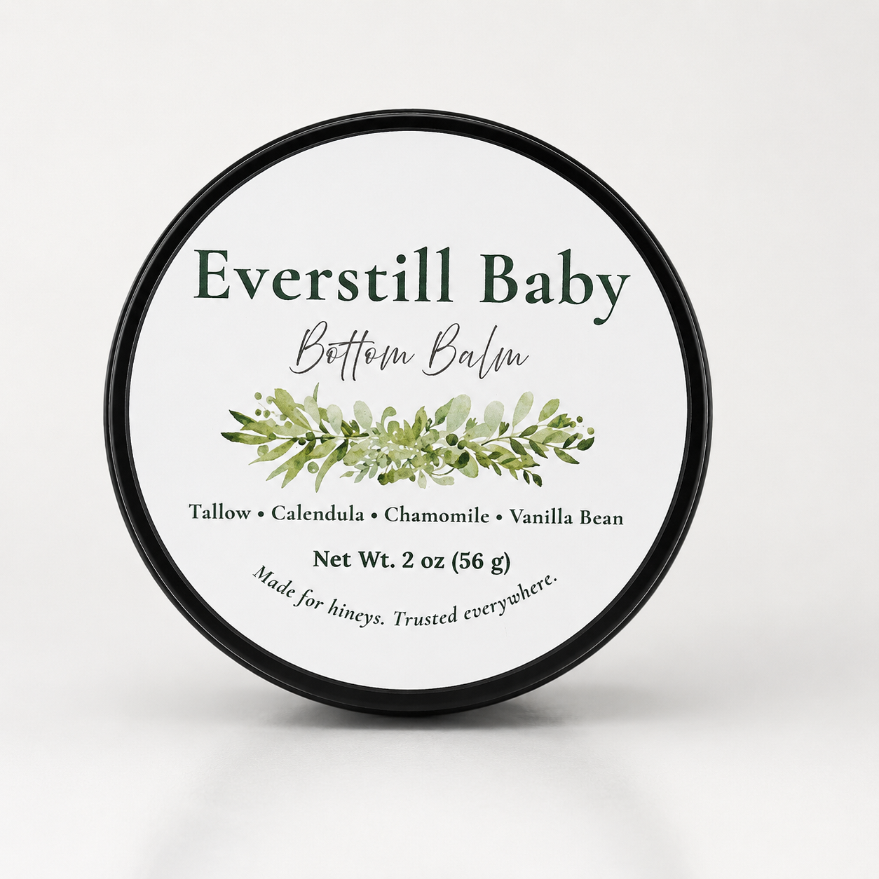 Everstill Baby Bottom Balm black tin with botanical label on light neutral background
