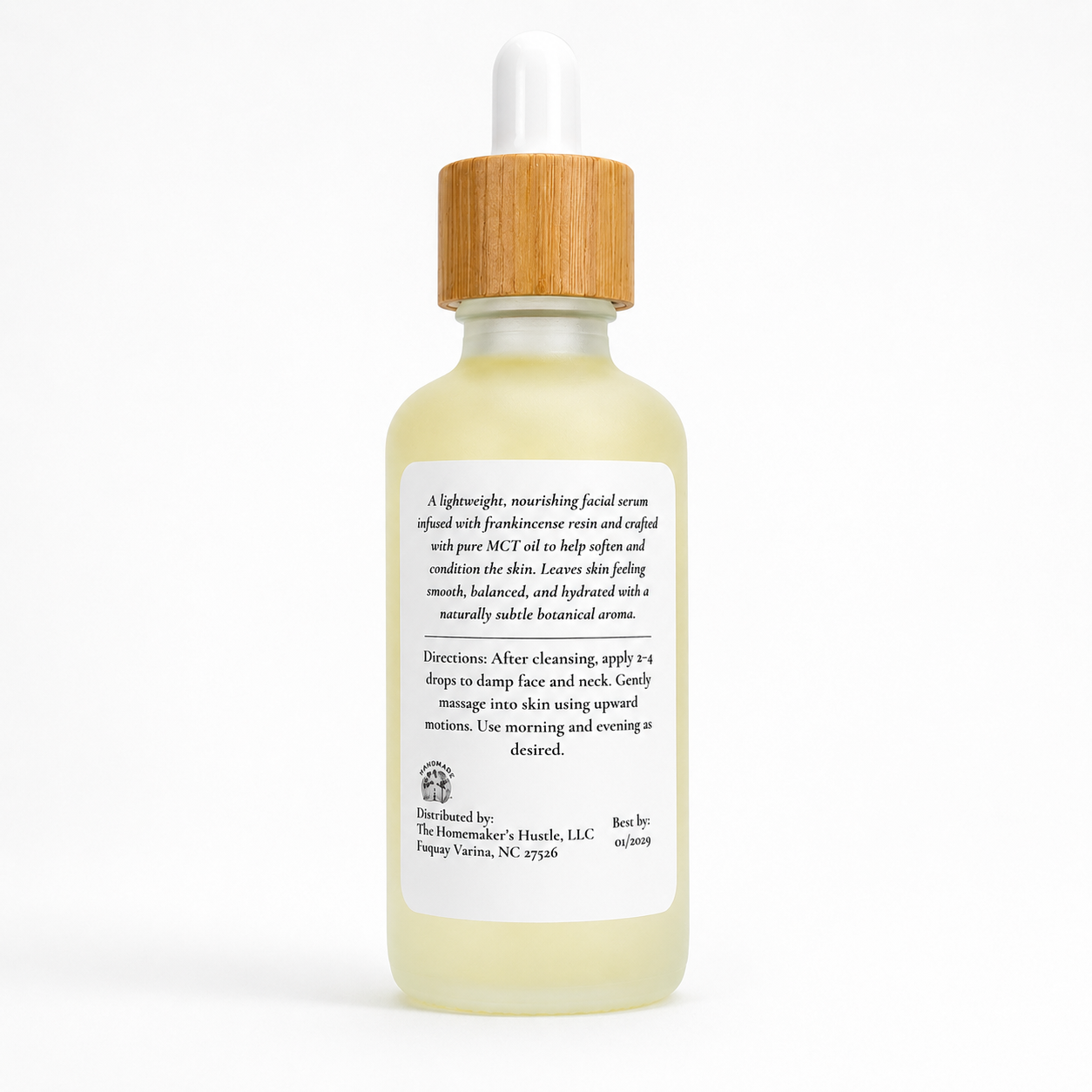 Back view of Everstill Frankincense Infused Oil bottle with usage directions and product information.