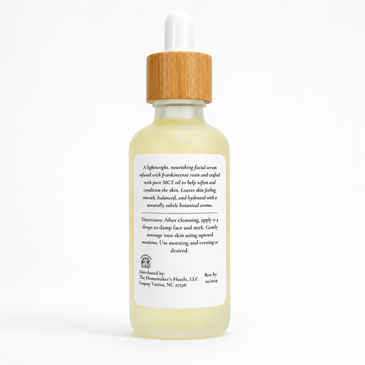 Back view of Everstill Frankincense Infused Oil bottle with usage directions and product information.