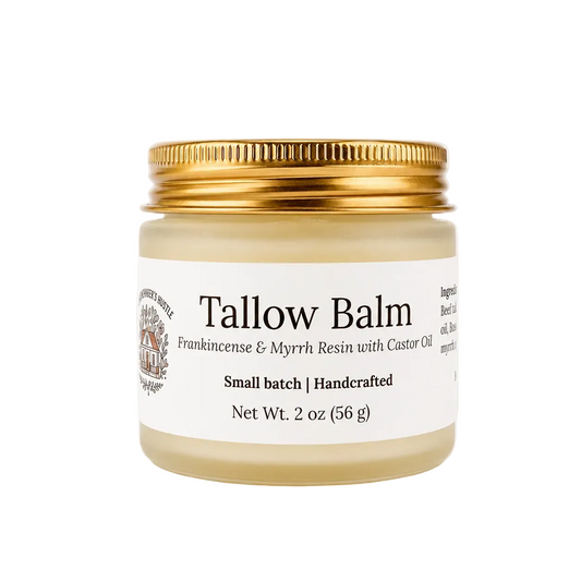 Jar of tallow balm with gold lid and white label