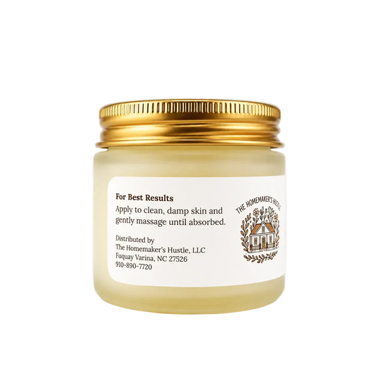 Jar of cream with a gold lid on a white background